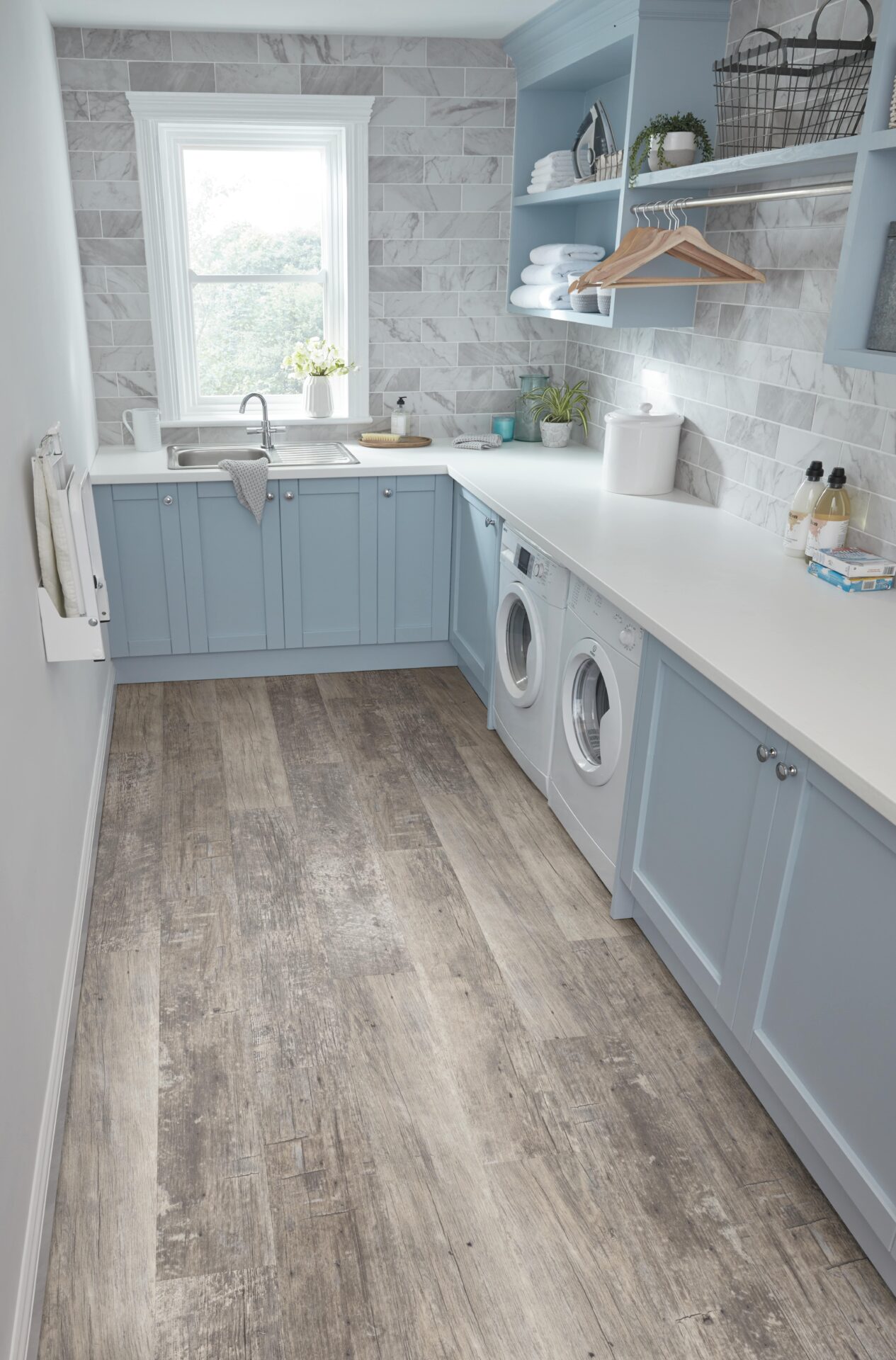 Vinyl Aged Redwood flooring in the laundry utility room Sherwood flooring company