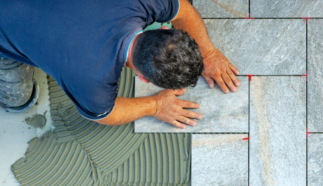 Sherwood Flooring company technician installing floors